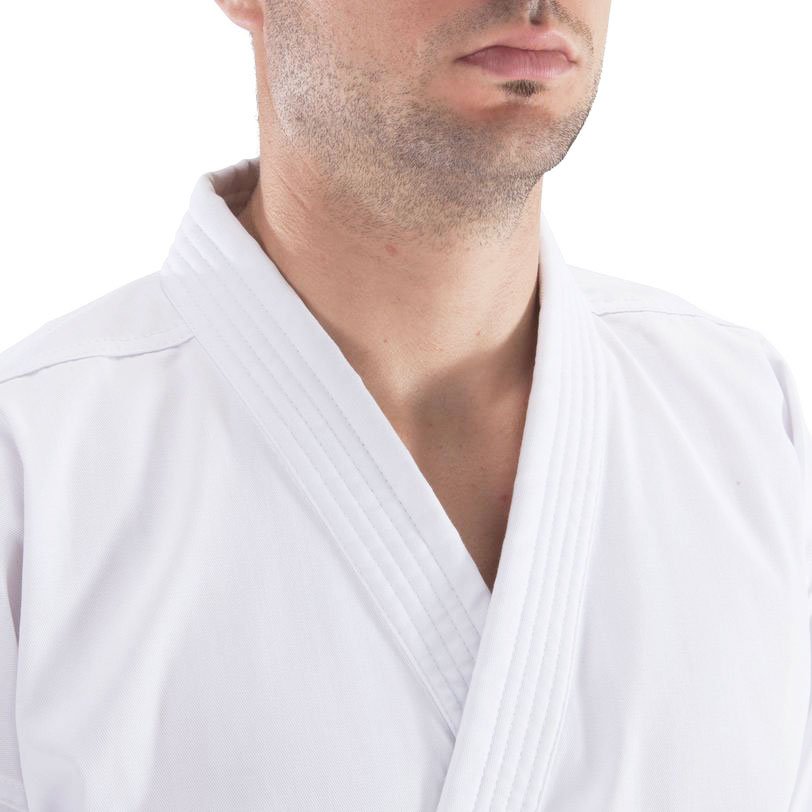 Front view of QTKU-001 wholesale karate uniform showing traditional Y-lapel crossover design and crisp fabric