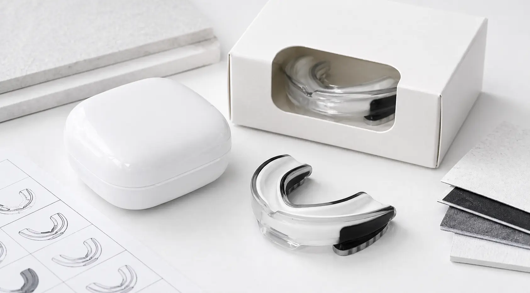 Sports mouth guard with white case, packaging box and sourcing materials for private label programs