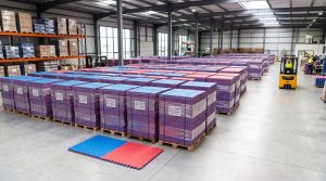EVA puzzle mats in the Tide Sports warehouse Interlocking EVA puzzle mats stacked in the Tide Sports warehouse ready for export
